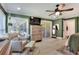 Bright main bedroom with a ceiling fan, and neutral colors at 930 Country Oaks Ln, Lakeland, FL 33810