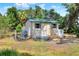 View of shed with deck and ramp, offering additional storage or workspace at 930 Country Oaks Ln, Lakeland, FL 33810