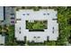 Top-down aerial of building highlighting the landscaped courtyard and roof-mounted HVAC at 1130 N Lake Parker Ave # C321, Lakeland, FL 33805