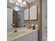 Bathroom features ample storage space, a vanity, and a shower at 1130 N Lake Parker Ave # C321, Lakeland, FL 33805