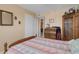 Bedroom featuring a closet and vintage wooden furnishings at 1130 N Lake Parker Ave # C321, Lakeland, FL 33805
