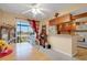 Bright dining area with a breakfast bar and view of the balcony at 1130 N Lake Parker Ave # C321, Lakeland, FL 33805