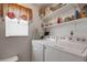 Bright laundry room equipped with modern washer and dryer at 1130 N Lake Parker Ave # C321, Lakeland, FL 33805