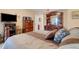 Serene main bedroom featuring a comfy bed and traditional wood furniture at 1130 N Lake Parker Ave # C321, Lakeland, FL 33805