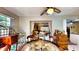 Open-concept dining area with seamless access to a living room area and kitchen at 1195 E George St, Bartow, FL 33830