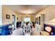 Traditional dining room with chandelier, decorative wainscoting, and classic furnishings at 1195 E George St, Bartow, FL 33830