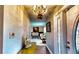 Welcoming entryway featuring stylish decor, tile flooring, and an inviting view into the home at 1195 E George St, Bartow, FL 33830
