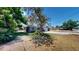 A charming home exterior with a well-kept lawn, showcasing curb appeal and neighborhood charm at 1195 E George St, Bartow, FL 33830