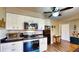 Modern kitchen with stainless steel appliances, sleek countertops, and ample cabinet space at 1195 E George St, Bartow, FL 33830