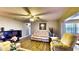 Cozy living room featuring hardwood floors, a ceiling fan, and comfortable seating at 1195 E George St, Bartow, FL 33830