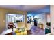 Inviting open-concept layout seamlessly connects the living room to the kitchen and dining areas at 1195 E George St, Bartow, FL 33830