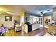 Bright, open concept living space with kitchen, dining, and seating areas at 1195 E George St, Bartow, FL 33830