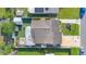 Aerial view of the house showing the roof, yard, and outdoor living areas at 1210 Marrick Cir, Lakeland, FL 33815