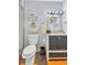 Cozy bathroom with modern fixtures, a stylish vanity, and a walk-in shower at 1210 Marrick Cir, Lakeland, FL 33815