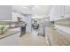 Well-lit kitchen with granite countertops, stainless steel appliances, and seamless access to a cozy living space at 1210 Marrick Cir, Lakeland, FL 33815