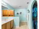 Well-lit bathroom with a double sink vanity, bathtub, and a closet for storage at 1216 Myopia Hunt Club Dr, Auburndale, FL 33823