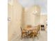 This dining room has a wooden table, 4 chairs, and a chandelier at 1216 Myopia Hunt Club Dr, Auburndale, FL 33823