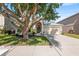 Inviting single-story home with a well-manicured lawn and mature tree in a desirable neighborhood at 1216 Myopia Hunt Club Dr, Auburndale, FL 33823