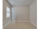 Bedroom featuring neutral walls, carpet, and a door leading to a closet at 1295 Osprey Landing Dr, Lakeland, FL 33813