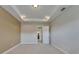Bedroom with neutral walls, carpeting, recessed lighting and tray ceilings at 1295 Osprey Landing Dr, Lakeland, FL 33813