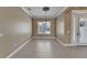 Inviting dining space with natural light and an elegant chandelier, ideal for gatherings and meals at 1295 Osprey Landing Dr, Lakeland, FL 33813