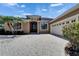 The residence features a two-car garage, providing convenience and ample parking space for homeowners at 1295 Osprey Landing Dr, Lakeland, FL 33813