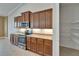 Kitchen boasts stainless steel appliances, granite countertops and spacious pantry at 1295 Osprey Landing Dr, Lakeland, FL 33813