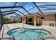 Screened-in lanai featuring a pool, covered lanai, and outdoor seating area at 1295 Osprey Landing Dr, Lakeland, FL 33813
