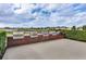Outdoor grilling area with multiple grills, perfect for community cookouts and gatherings at 1394 Oakmont Dr, Winter Haven, FL 33884