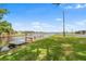 Picturesque waterfront view with a private dock, perfect for boating and fishing at 145 Jana Cir, Auburndale, FL 33823