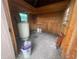 Plywood interior with water heater and storage buckets at 14810 Brahma Rd, Polk City, FL 33868