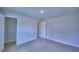 Neutral bedroom with carpeting, recessed lighting, and access to a closet and the hallway at 1517 Leamington Ln, Winter Haven, FL 33884