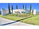 Welcome to Villa Mar! A stone community sign surrounded by lush landscaping and manicured lawns at 1517 Leamington Ln, Winter Haven, FL 33884