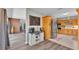 Spacious kitchen with wood cabinets, stainless steel appliances, and a chalkboard at 1854 Sherwood Lakes Blvd, Lakeland, FL 33809