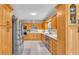 Kitchen with light-colored wood cabinets, stainless steel appliances and tile backsplash at 1854 Sherwood Lakes Blvd, Lakeland, FL 33809