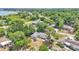 An aerial view of a house featuring a trampoline and a backyard playground at 1965 Avenue F Sw, Winter Haven, FL 33880