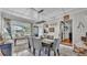 Traditional dining room with stylish gray chairs, decorative wall art, and an abundance of natural light at 1965 Avenue F Sw, Winter Haven, FL 33880
