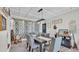Dining room featuring a large table, comfortable chairs, modern lighting, and decorative accents for Gathering gatherings at 1965 Avenue F Sw, Winter Haven, FL 33880