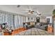 Inviting living room with hardwood floors, large windows, and comfortable seating at 1965 Avenue F Sw, Winter Haven, FL 33880