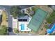 Overhead aerial view of community pool and tennis court at 2015 Hatteras Pt, Lakeland, FL 33813