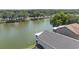 Aerial view of the backyard featuring a lake and view of other neighborhood homes at 2015 Hatteras Pt, Lakeland, FL 33813