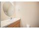 Bathroom featuring a vanity with sink, mirror, and storage at 2015 Hatteras Pt, Lakeland, FL 33813