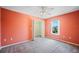 Bedroom with ample closet space and a window that fills the room with natural light at 2015 Hatteras Pt, Lakeland, FL 33813