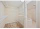 Walk-in closet with adjustable shelving for optimal storage; ensuite bath with soaking tub at 2015 Hatteras Pt, Lakeland, FL 33813