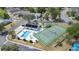 Aerial view of community pool and tennis courts; perfect for active living at 2015 Hatteras Pt, Lakeland, FL 33813