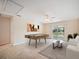 Large game room area overlooking the lake, with contemporary furniture at 2015 Hatteras Pt, Lakeland, FL 33813