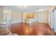 The main living space is open and bright, featuring hardwood floors, and an adjoining kitchen at 2015 Hatteras Pt, Lakeland, FL 33813
