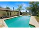 Sparkling pool with ample concrete decking, ideal for entertaining near the house at 2103 Sylvester Ct, Lakeland, FL 33803