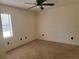 Bedroom featuring carpeted flooring and a window with blinds at 2213 Eastmeadows Rd, Lakeland, FL 33812