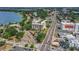Stunning aerial view of the building, showcasing its location near a lake and major roads at 235 6Th Nw St # 307, Winter Haven, FL 33881